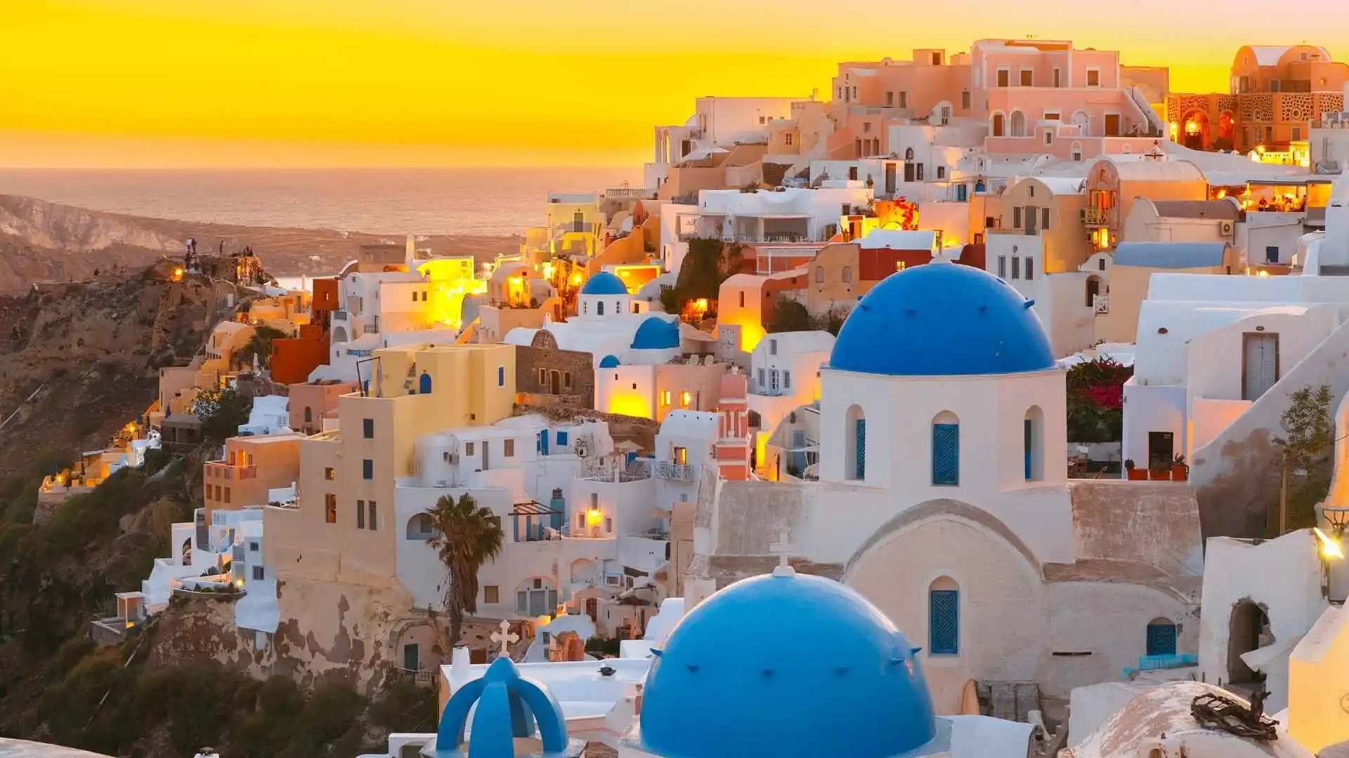Watch the sunset in Santorini